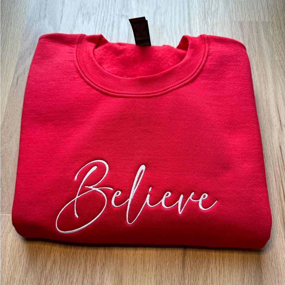 Red embroidered Christmas sweatshirt. Size S,M or L. New without tag. Nice gift.